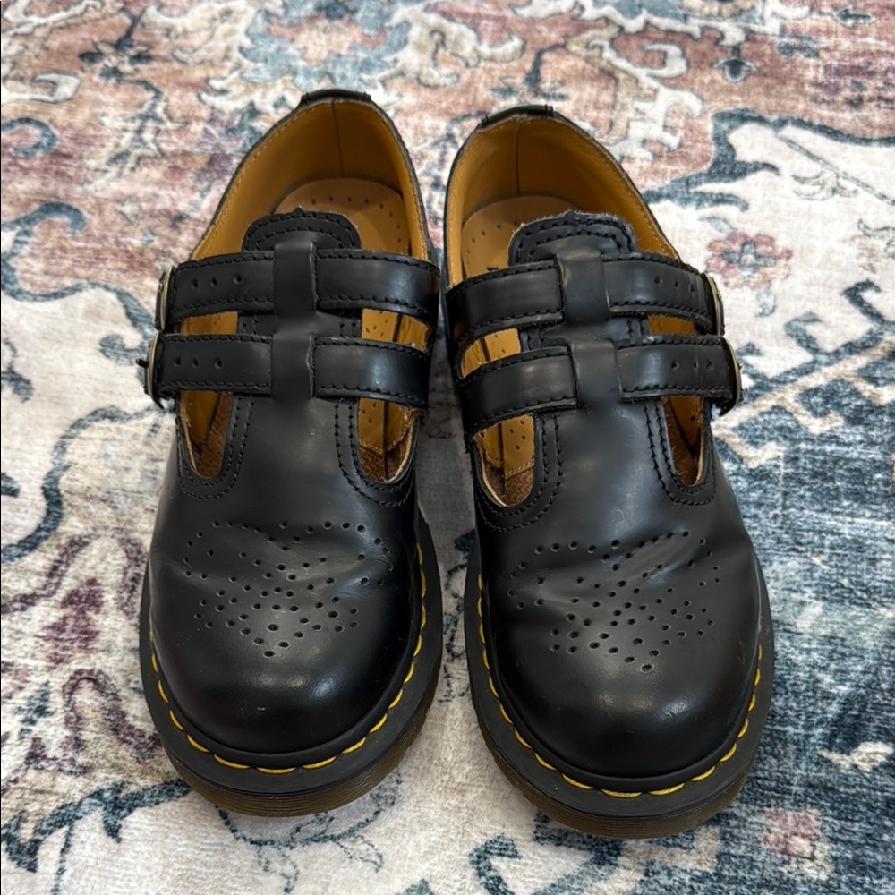 Dr. Martens Black Leather Flats with Yellow Stitching